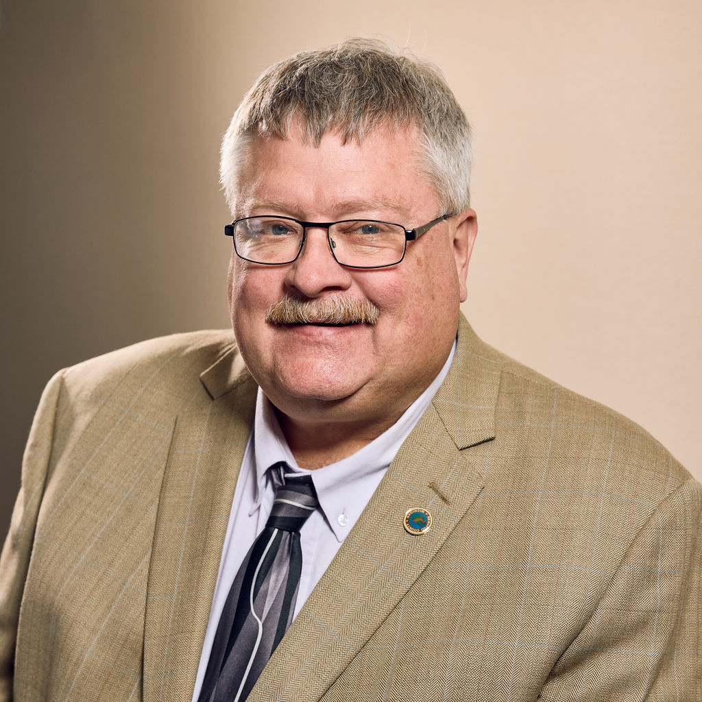 Headshot image of board member Bryan Kolk