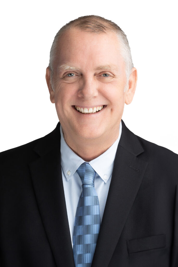 Headshot photo of Eric Waidelich a CompOne contact