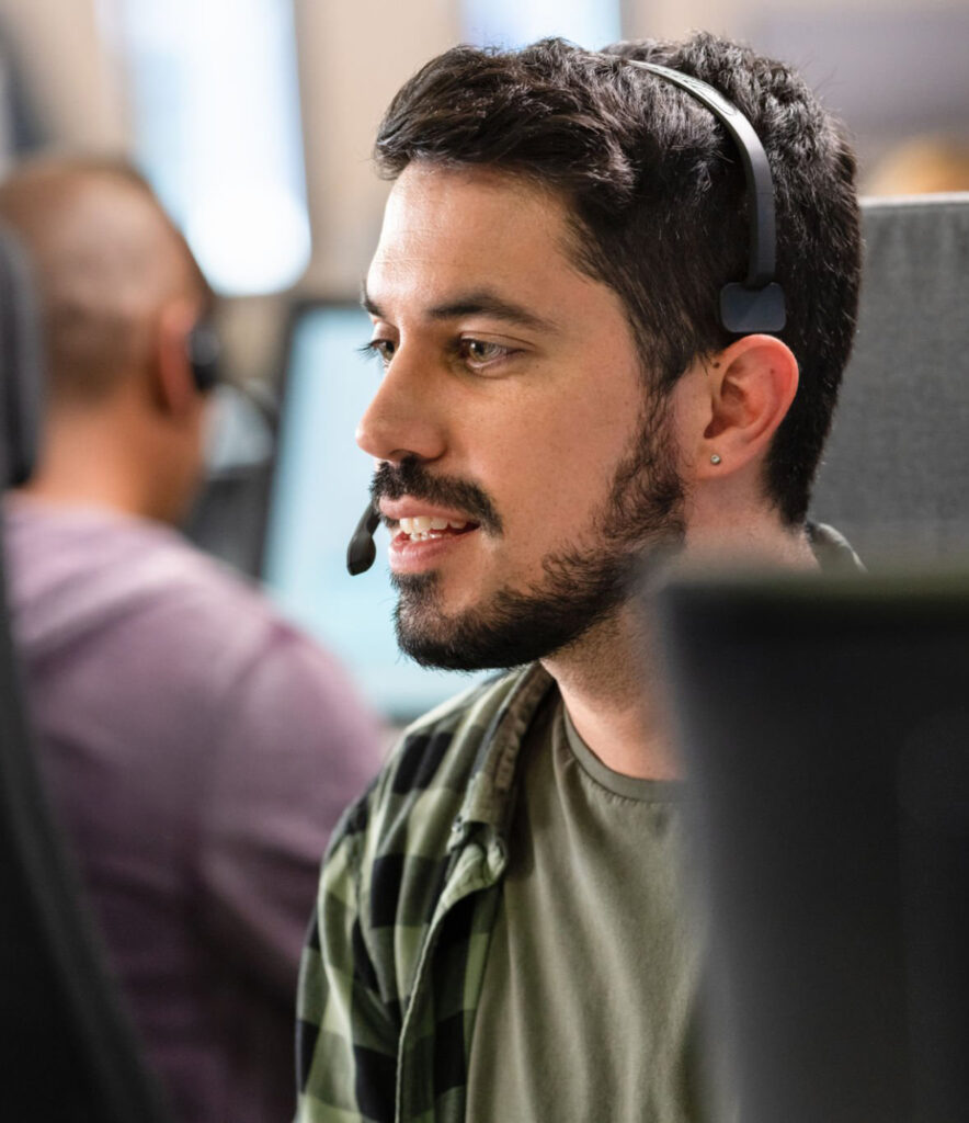 Customer service representative assisting MCWCF members via phone.