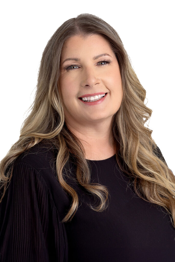 Headshot image of Michelle Hibbard a CompOne contact